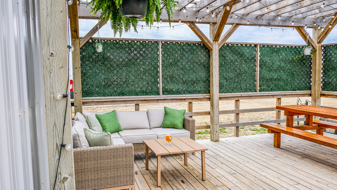Snake Lake Brewing patio with lounge seating, pergola and string lights