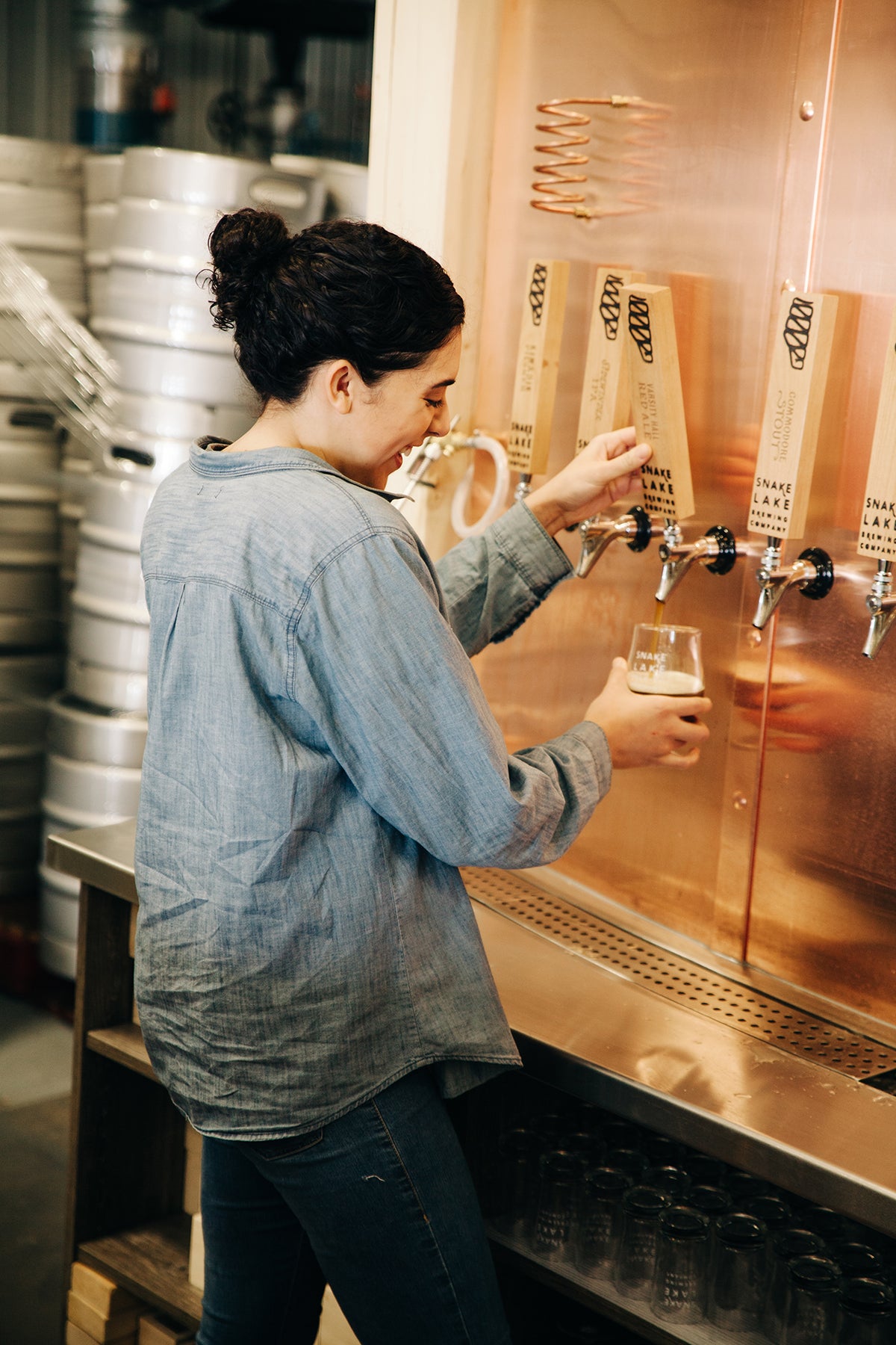 Serving Snake Lake beer at the taproom taps
